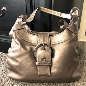 Coach bronze Soho Lynn Hobo buckle bag. Good used condition normal wear